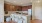 a kitchen with wooden cabinets