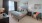 a bedroom with a bed and a desk