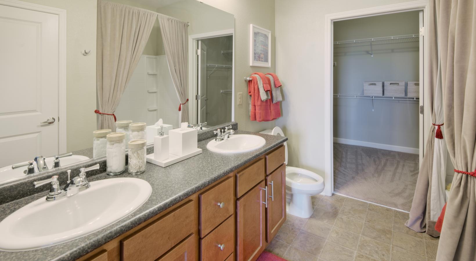 Bathroom options with thoughtful details a bathroom with a large mirror