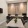 a clubhouse room with a table and chairs