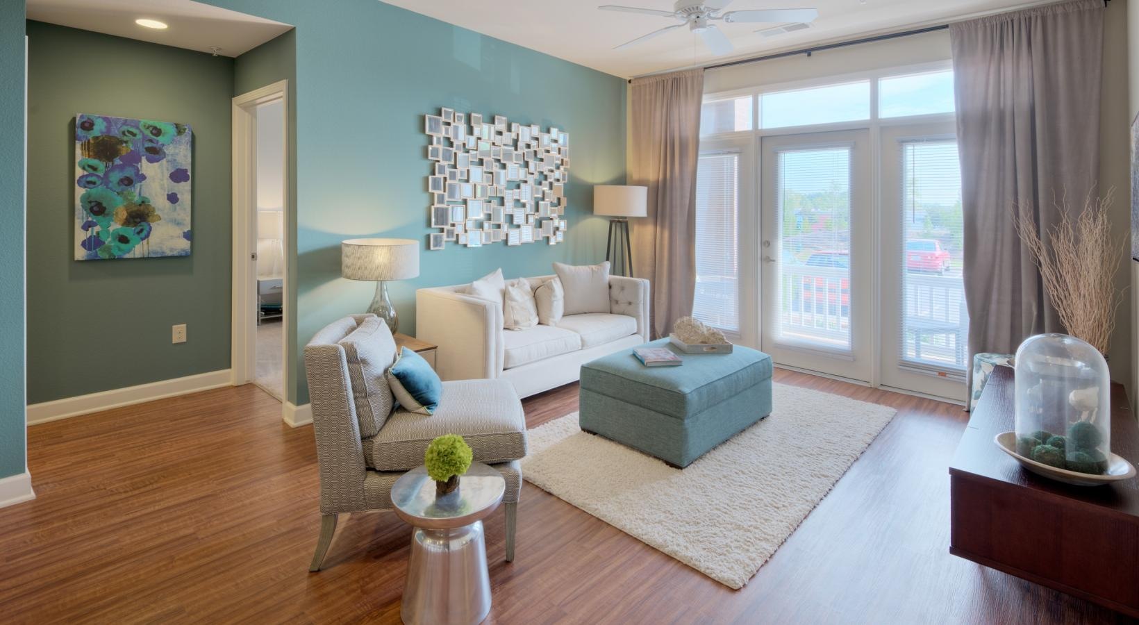 Gorgeous living areas to entertain and enjoy a living room with a large rug and a couch